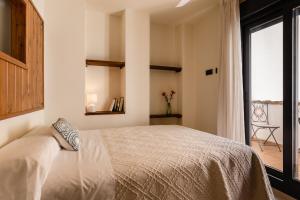 Ліжко або ліжка в номері La Casa De Almocita