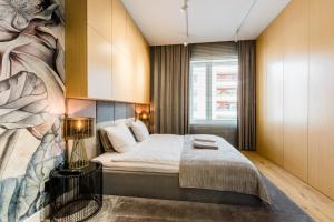 Łóżko lub łóżka w pokoju w obiekcie Apartament nad jeziorem Długim Leśna # 28