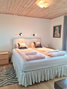 Postel nebo postele na pokoji v ubytování Stóraborg Holiday Home