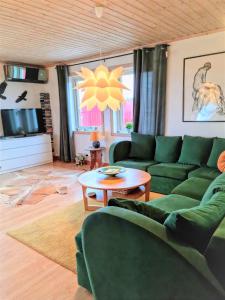 Posezení v ubytování Stóraborg Holiday Home