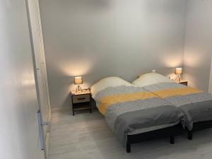 Posteľ alebo postele v izbe v ubytovaní Superbe appartement climatisé avec parking privé
