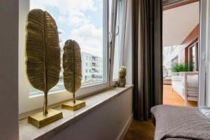 Łóżko lub łóżka w pokoju w obiekcie Apartament nad jeziorem Długim Leśna # 28