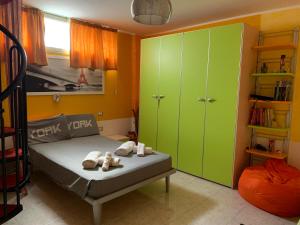 Posteľ alebo postele v izbe v ubytovaní Casa Arancio