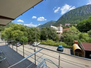 a balcony with a view of a parking lot at Pensiunea Argus in Băile Herculane