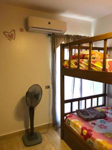 Postel nebo postele na pokoji v ubytování Blumar North Coast families only - قرية بلومار الساحل الشمالي عائلات فقط