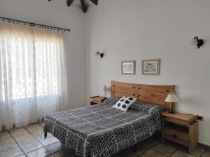 Кровать или кровати в номере CERCADO DEL MEDIO, CHALET con PISCINA PRIVADA