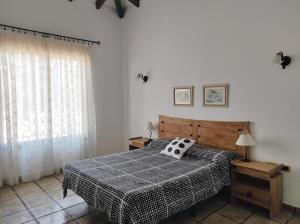 Posteľ alebo postele v izbe v ubytovaní CERCADO DEL MEDIO, CHALET con PISCINA PRIVADA + 22 fotografií