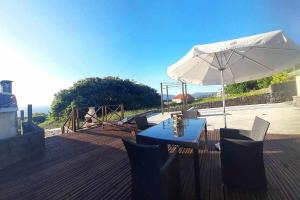 Fotografie z fotogalerie ubytování Casa Machina casa con amplia terraza y barbacoa v destinaci Carnota