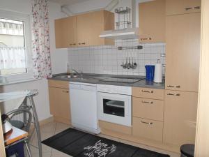 Kuchyň nebo kuchyňský kout v ubytování Ferienwohnung Kunst