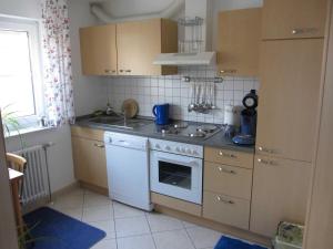 Kuchyň nebo kuchyňský kout v ubytování Ferienwohnung Kunst