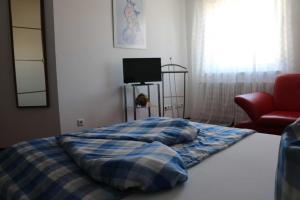 Postel nebo postele na pokoji v ubytování Ferienwohnung Kunst