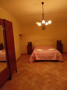 Ліжко або ліжка в номері La Casa di Ida