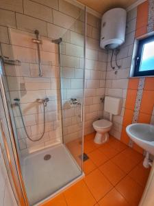 Bathroom sa Apartments Luza