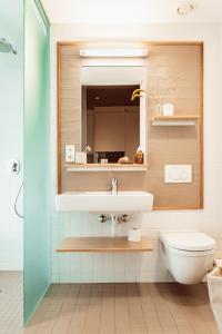 Kamar mandi di Ariv Apartments & Spaces - self check-in