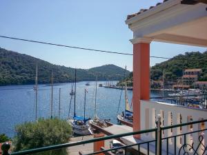 a view of a marina with boats in the water at Asterida in Sivota