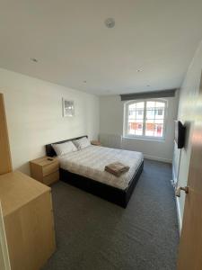 Llit o llits en una habitació de 3 bed apartment in London Plumstead