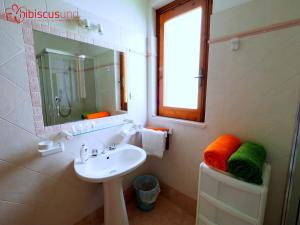 Koupelna v ubytování HibiscusUno Tropea Residence