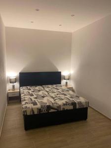 Posteľ alebo postele v izbe v ubytovaní Apartmán Levandule
