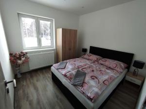 Posteľ alebo postele v izbe v ubytovaní Apartmán Levandule