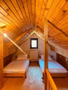 Postel nebo postele na pokoji v ubytování Hill Durmitor