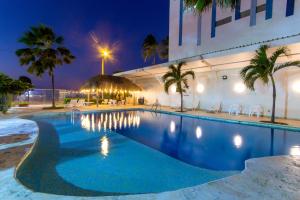 Bazén v ubytování Hotel Playa Club nebo v jeho okolí