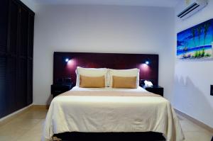 Postel nebo postele na pokoji v ubytování Hotel Playa Club
