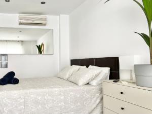 Posteľ alebo postele v izbe v ubytovaní Apartamentos Varela 14