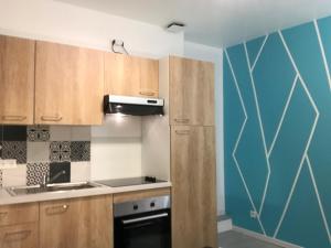 Kuchyňa alebo kuchynka v ubytovaní LE CLOS CHASSAING N1 - Wifi - Centre ville-PROPERTY RENTAL NM