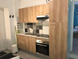 Kuchyňa alebo kuchynka v ubytovaní LE CLOS CHASSAING N1 - Wifi - Centre ville-PROPERTY RENTAL NM