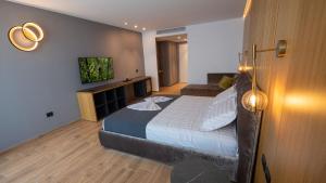 Ліжко або ліжка в номері Casa Del Sol - Luxury Villas