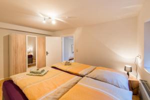Łóżko lub łóżka w pokoju w obiekcie Apartment im Harz