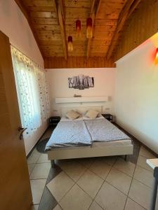 Posteľ alebo postele v izbe v ubytovaní Guesthouse Hodak