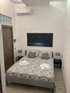 Postel nebo postele na pokoji v ubytování Prima Stella Tourist Rooms