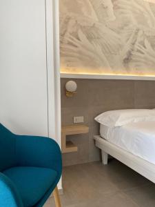 Tempat tidur dalam kamar di Porta dell'est