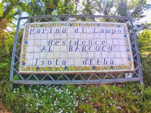 a sign for the disneyland sign park at Al Barcoco in Marina di Campo