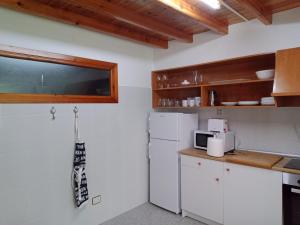 Kuchyňa alebo kuchynka v ubytovaní A Casa De Regina