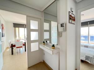 Posteľ alebo postele v izbe v ubytovaní Ático Bahía del Sol en Calpe con impresionantes vistas - Inmodream Calpe