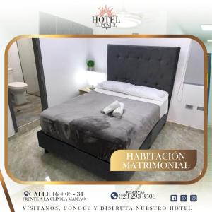 um cartaz para um hotel com uma cama num quarto em Hotel El Peniel em Maicao