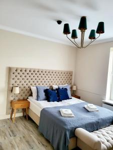 Giường trong phòng chung tại Villa Blue Mare