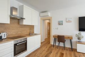 Kuchyň nebo kuchyňský kout v ubytování Deluxe Apartment Antonija