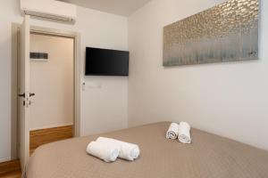 TV a/nebo společenská místnost v ubytování Deluxe Apartment Antonija