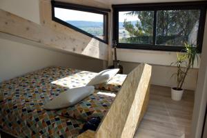 Posedenie v ubytovaní Appartement sur les toits, très jolie vue Provence