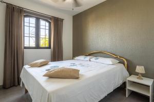 Postel nebo postele na pokoji v ubytování Casa Vista a Mar + 24 fotografií