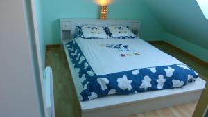 Postel nebo postele na pokoji v ubytování Residence des Ondines