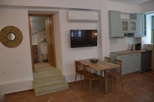 Kuchyň nebo kuchyňský kout v ubytování Laskarina Apartments
