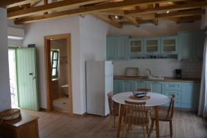 Kuchyň nebo kuchyňský kout v ubytování Laskarina Apartments