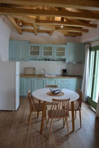 Kuchyň nebo kuchyňský kout v ubytování Laskarina Apartments