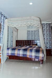 Łóżko lub łóżka w pokoju w obiekcie Hotel Santa Maria