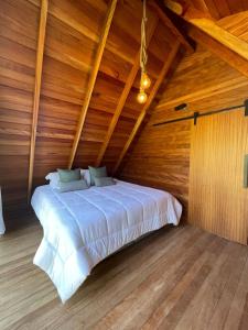 Cama o camas de una habitación en Cabana com jacuzzi Vista Mar Bombinhas