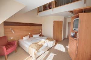 Postel nebo postele na pokoji v ubytování allgovia hotel garni
